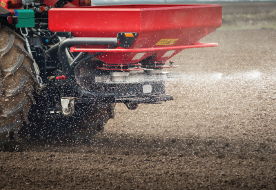 Farm vehicle applying nitrogen fertilizer to soil